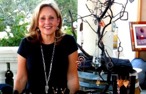 Artist Vikki Sylva with some of her jewelry